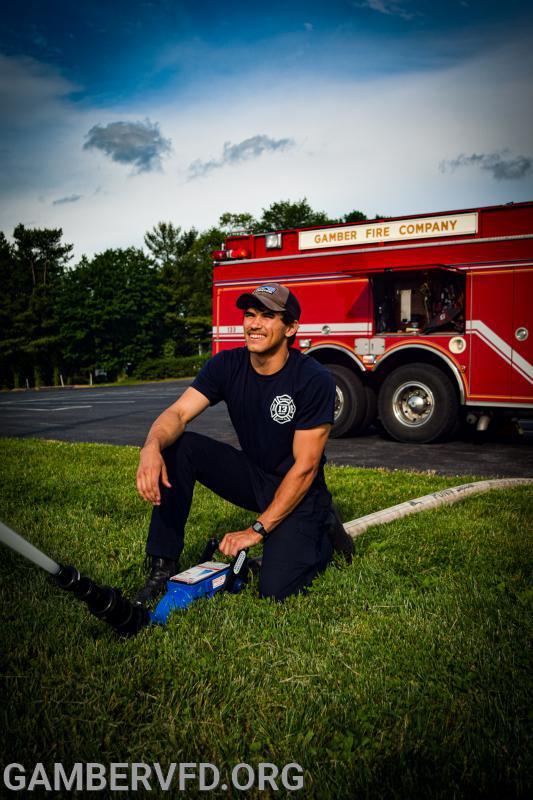 FF. Petrowicz operates the blitz fire nozzle during a training.