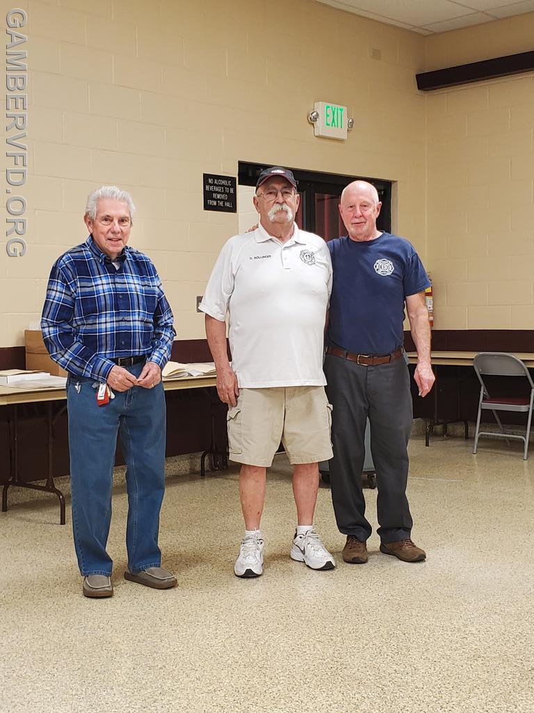 Art Frotton (L) and Stan Mertz (R) accept their 35 year membership pins from President Dale Bollinger.
