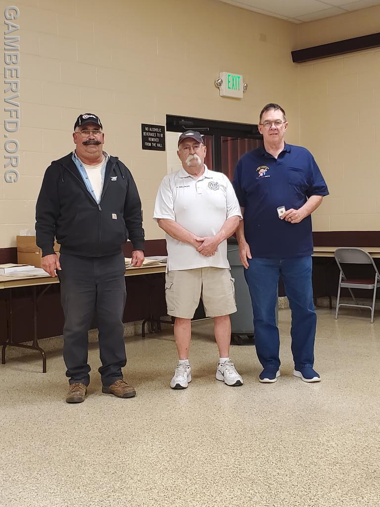 Mike Sullivan (L) and Chuck Doyle (R) accept their 40 year membership pins from President Dale Bollinger.