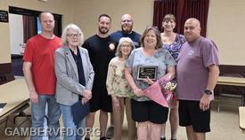 Chrissy Yingling, surrounded by her family, was honored with Hall of Fame membership at the fire company's May meeting. Presenting the award were CCVESA President, Jeff Fleming (far left), and Hall of Fame Chairperson, Marianne Warehime.