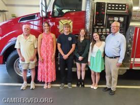 Terry Brothers (left) and Gary Brothers (right) with this year's Oscar Brothers Scholarship winners, from left, Amara Mohr, Jacob Reardon, Kiley Kelly, and Allison Gill.